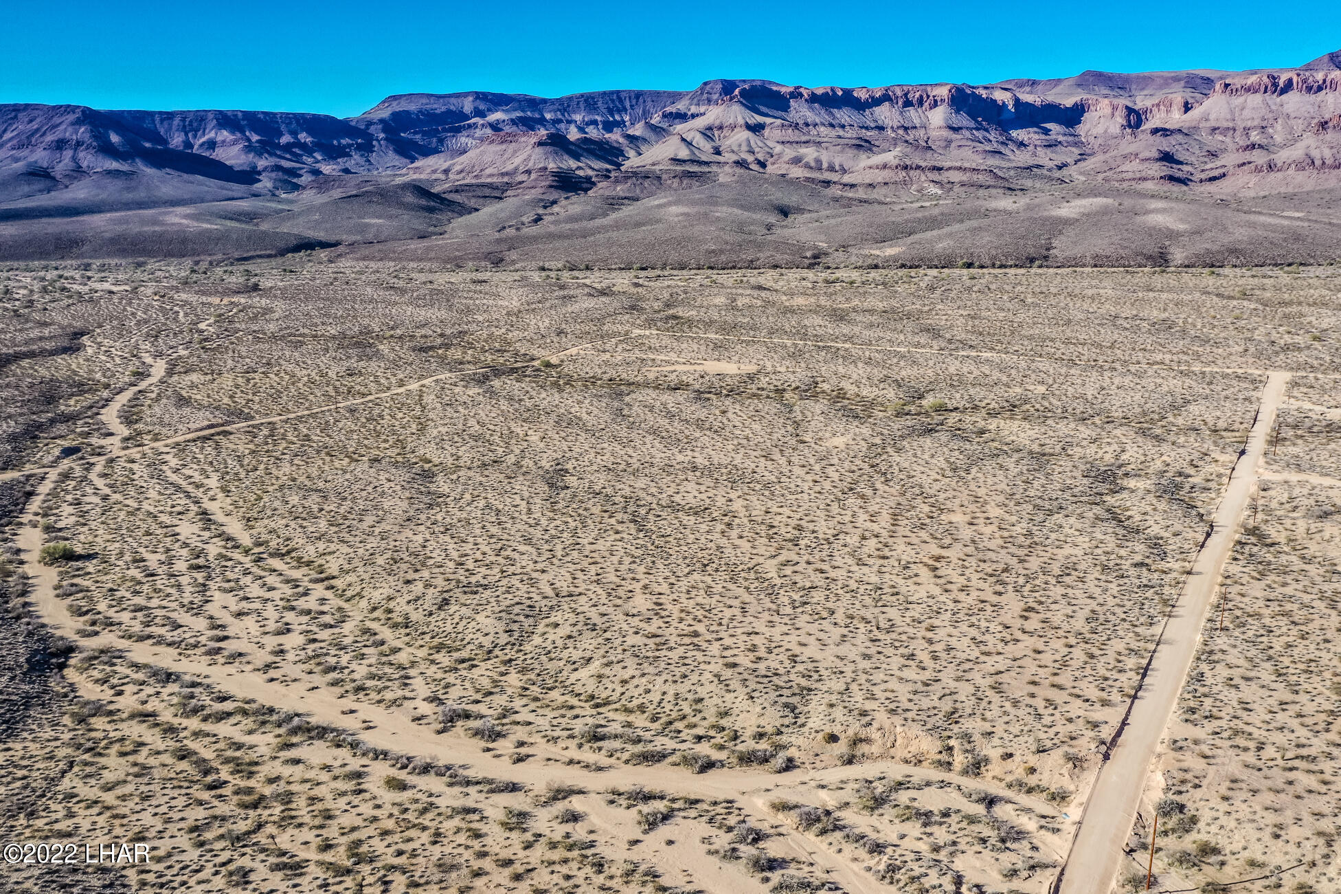 109 South McDowell Road Yucca, AZ 86438 - Photo 25 of 41 109A-BMcDowellRdSDrone_15