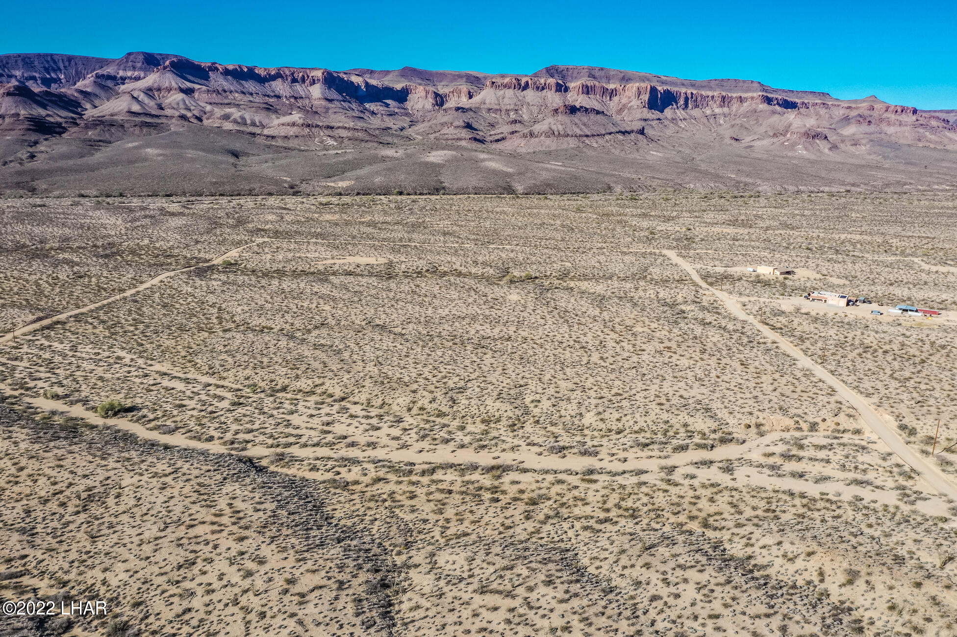 109 South McDowell Road Yucca, AZ 86438 - Photo 26 of 41 109A-BMcDowellRdSDrone_16
