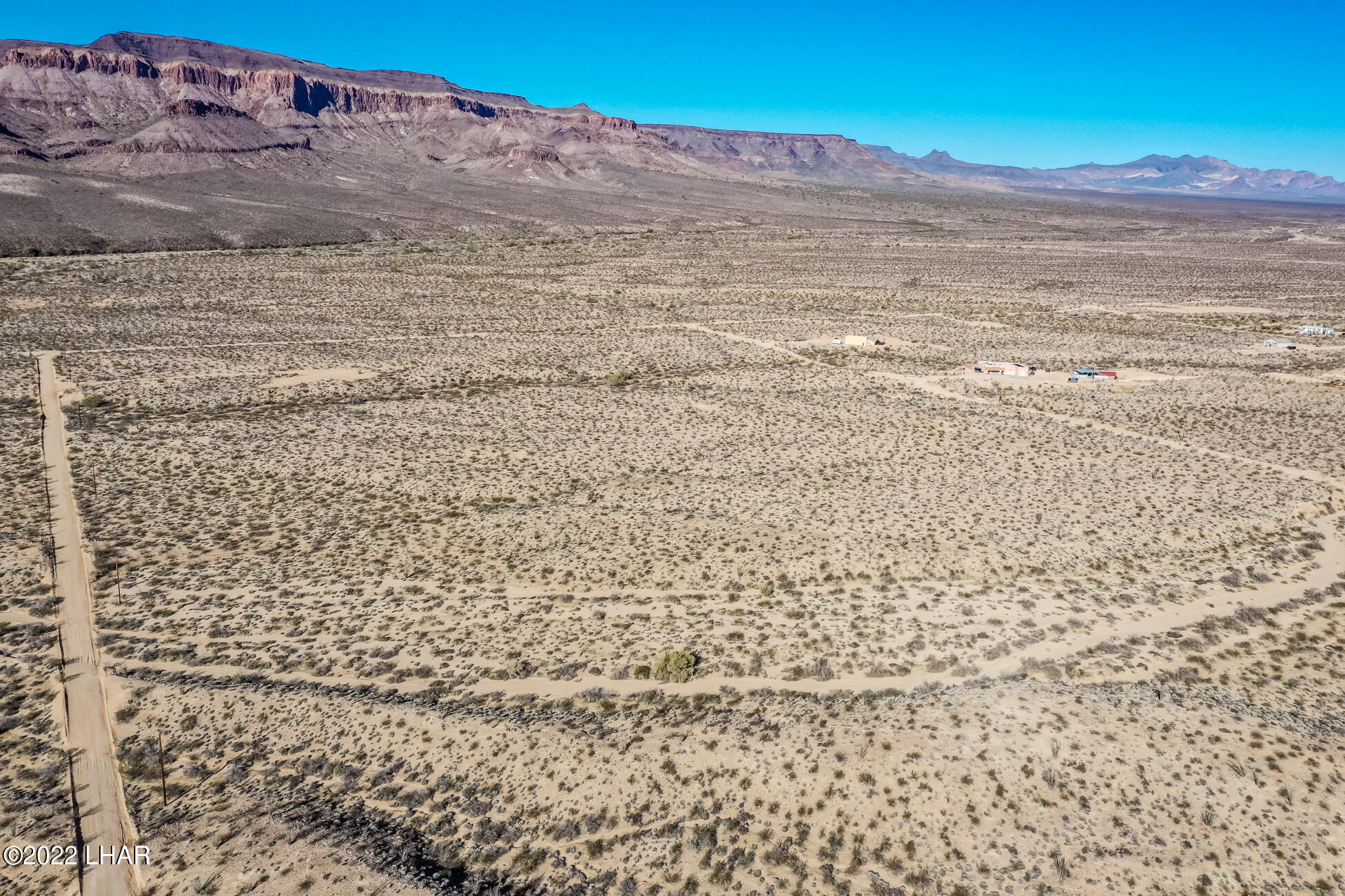 109 South McDowell Road Yucca, AZ 86438 - Photo 27 of 41 109A-BMcDowellRdSDrone_17
