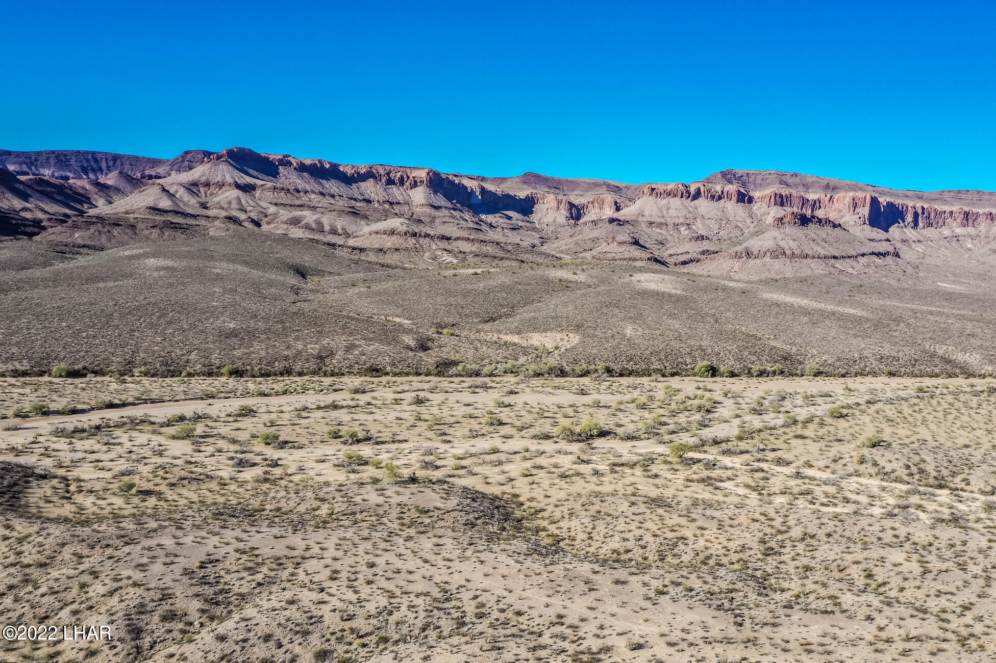 109 South McDowell Road Yucca, AZ 86438 - Photo 29 of 41 109A-BMcDowellRdSDrone_19