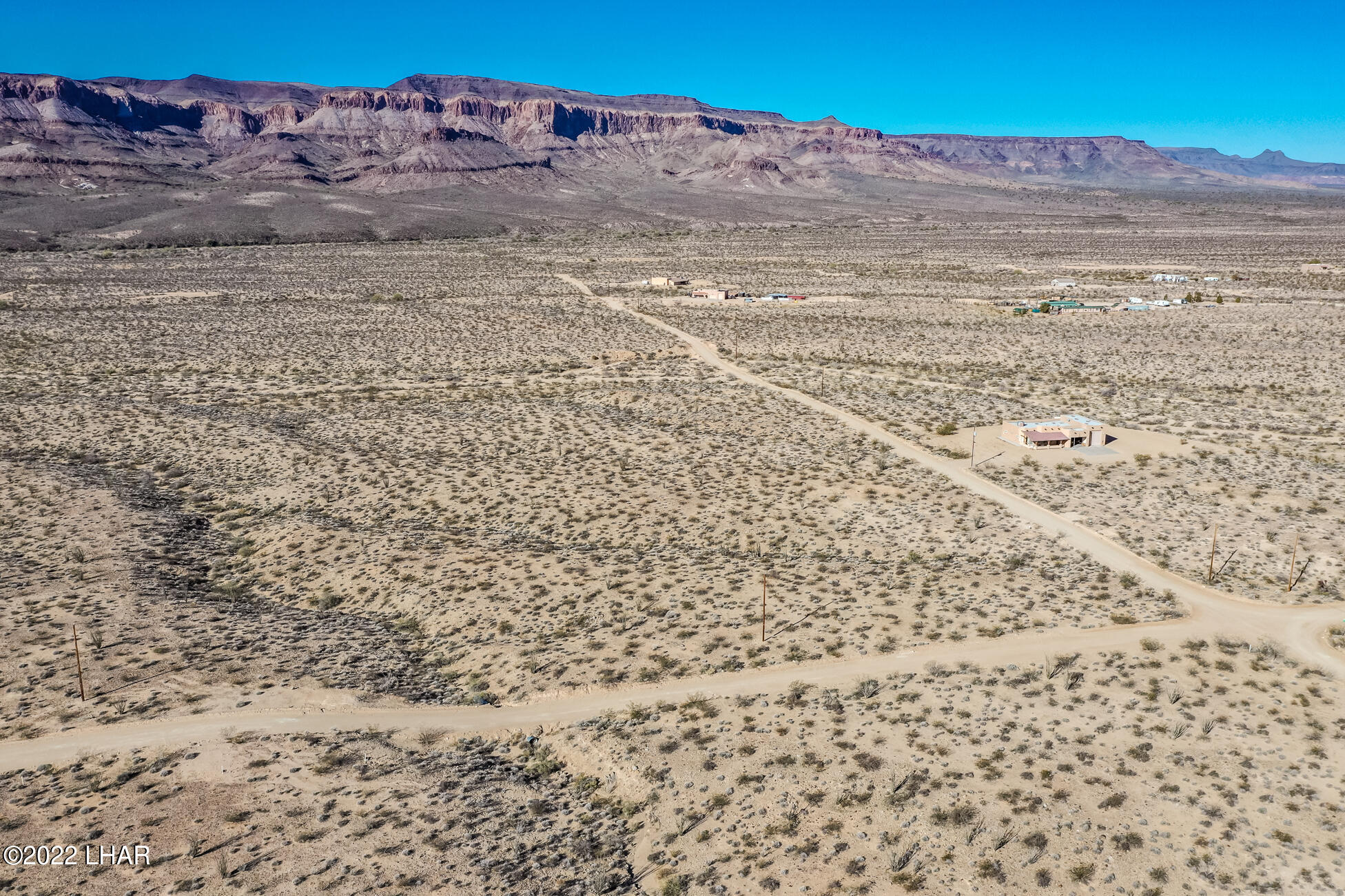 109 South McDowell Road Yucca, AZ 86438 - Photo 32 of 41 109A-BMcDowellRdSDrone_22