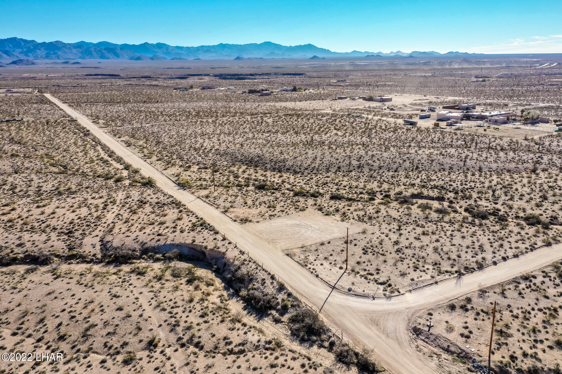 109 South McDowell Road Yucca, AZ 86438 - Photo 33 of 41 109A-BMcDowellRdSDrone_23