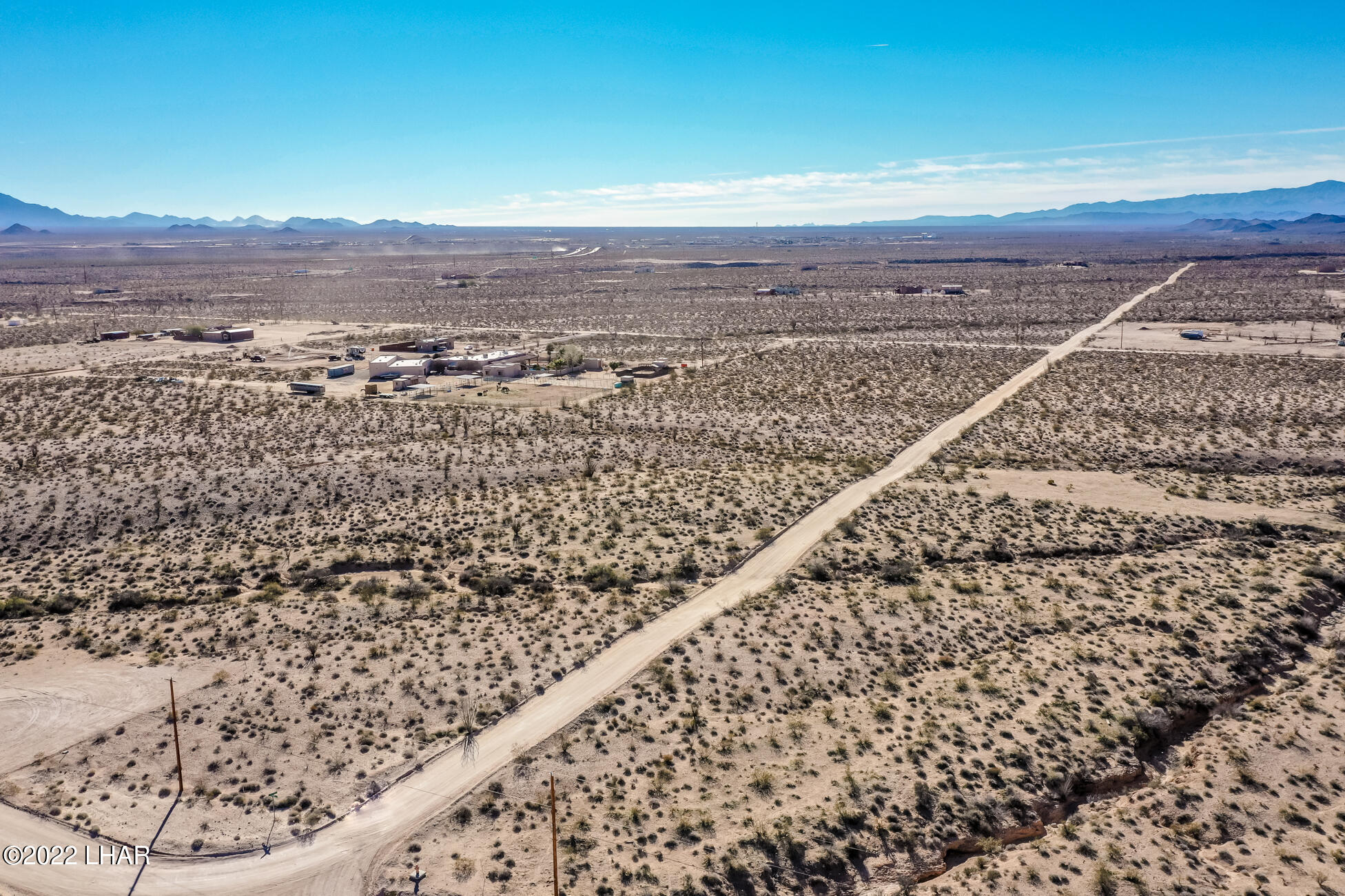 109 South McDowell Road Yucca, AZ 86438 - Photo 34 of 41 109A-BMcDowellRdSDrone_24
