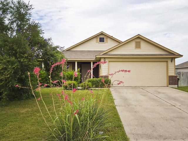 181 Spring Branch Drive Kyle, TX 78640 - Photo 1 of 1 a view of a house with backyard