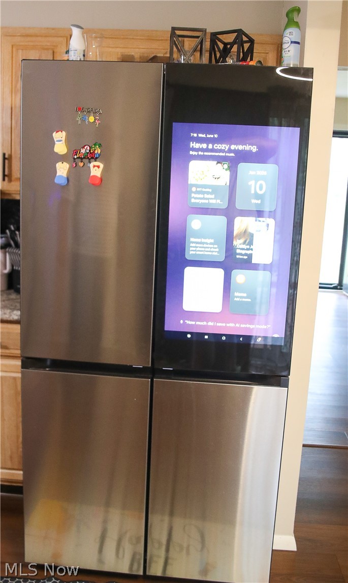 1258 Vane Avenue Akron, OH 44310 - Photo 8 of 12 Stainless steel French-door refrigerator featuring a large integrated digital display