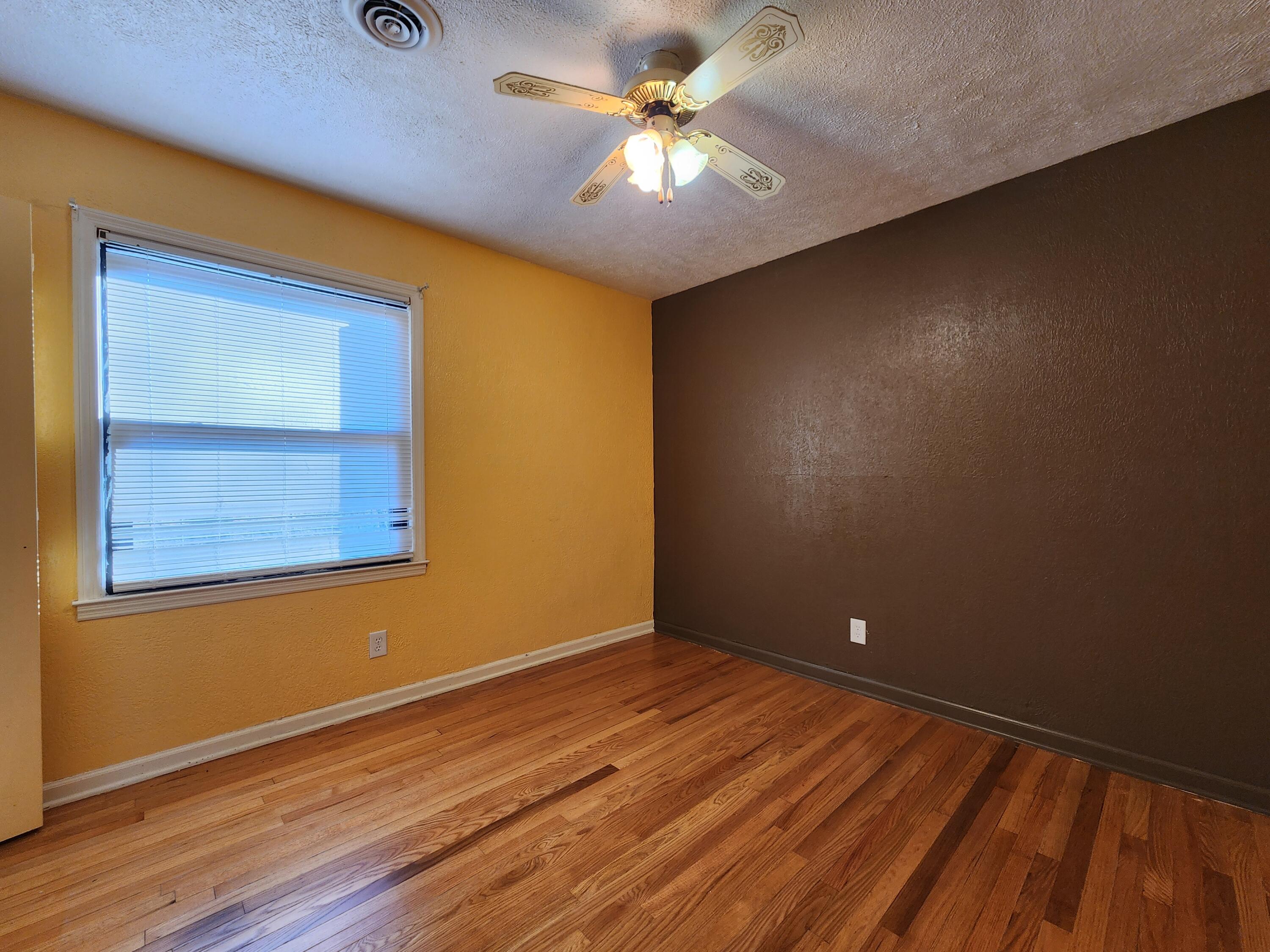 10519 Henry Road Henry, VA 24102 - Photo 12 of 26 a view of room with window and ceiling fan