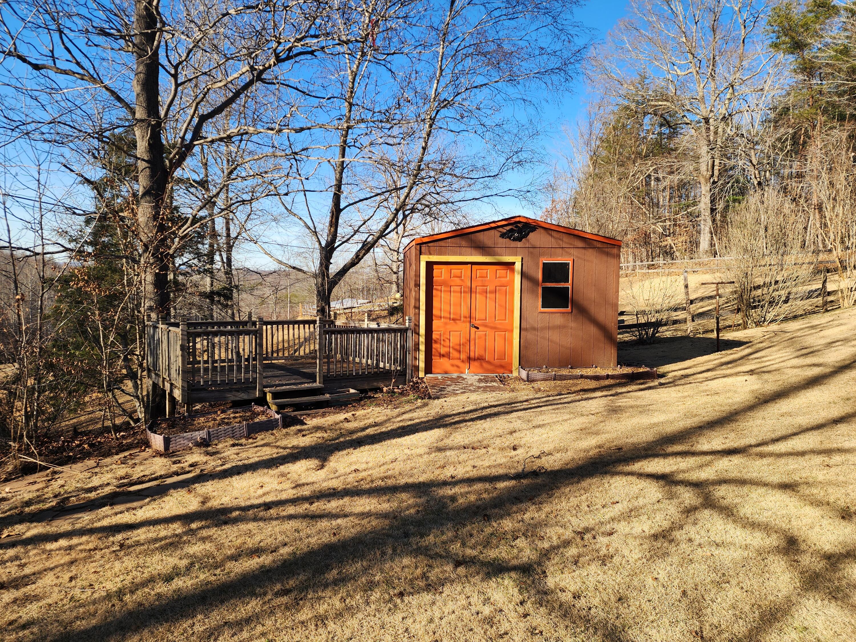 10519 Henry Road Henry, VA 24102 - Photo 25 of 26 a front view of a house with a yard