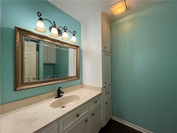 a bathroom with a toilet and a sink