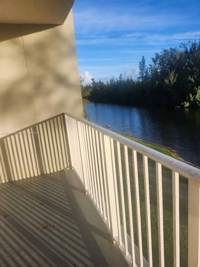 8240 Southwest 210th Street, Unit 220 Cutler Bay, FL 33189 - Photo 23 of 23 a view of balcony with furniture