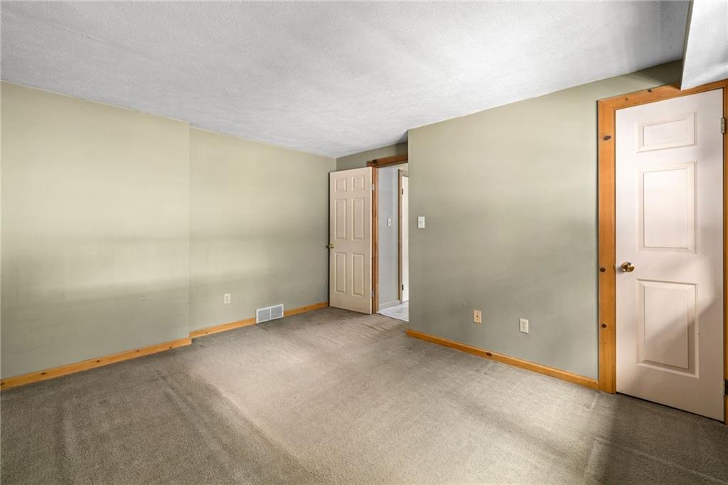 1335 Alamae Lakes Road Washington, PA 15301 - Photo 11 of 50 an empty room with a natural light