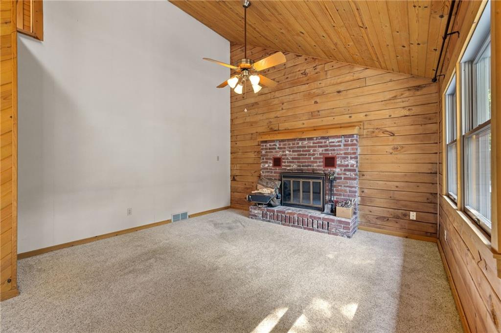 1335 Alamae Lakes Road Washington, PA 15301 - Photo 19 of 50 a view of an empty room with a fireplace