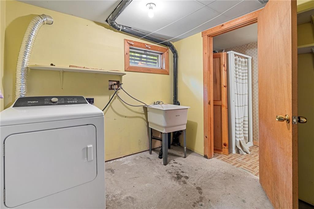1335 Alamae Lakes Road Washington, PA 15301 - Photo 40 of 50 a utility room with dryer and washer