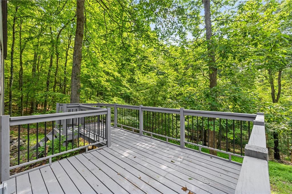 1335 Alamae Lakes Road Washington, PA 15301 - Photo 42 of 50 a view of balcony with deck and wooden floor