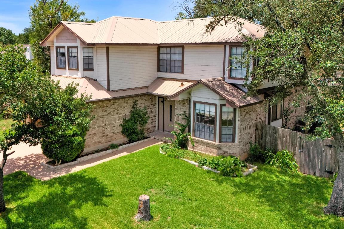 5900 Abilene Trail Austin, TX 78749 - Photo 1 of 1 a view of a house with a yard and potted plants