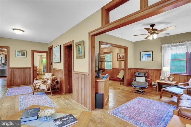 a bed room with a bed and a chandelier