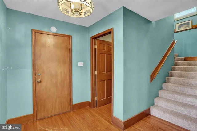 a view of a storage & utility room with two washing machine