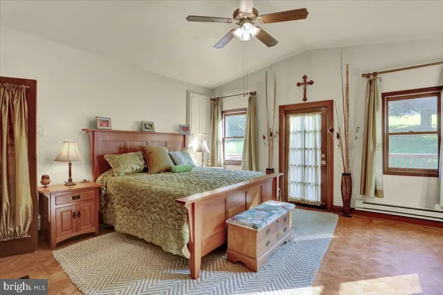 a backyard of a house with outdoor seating