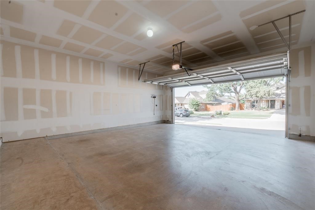 1333 Terrace View Drive Georgetown, TX 78628 - Photo 33 of 35 A spacious, clean garage ready for vehicles or extra storage.