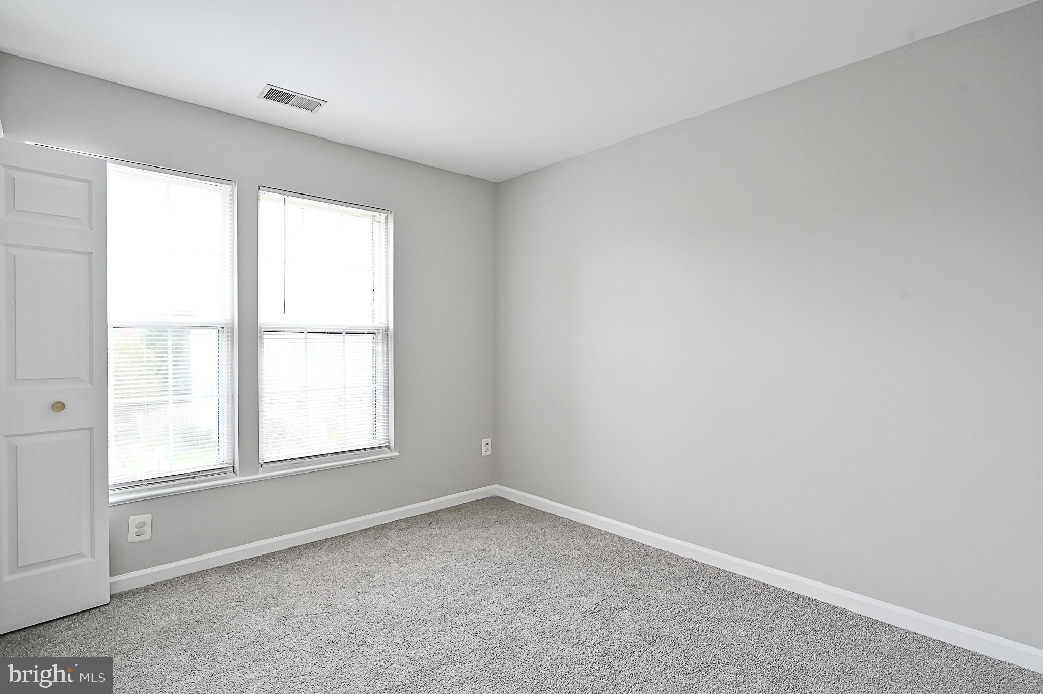 6356 Racetec Place Springfield, VA 22150 - Photo 35 of 51 an empty room with a window