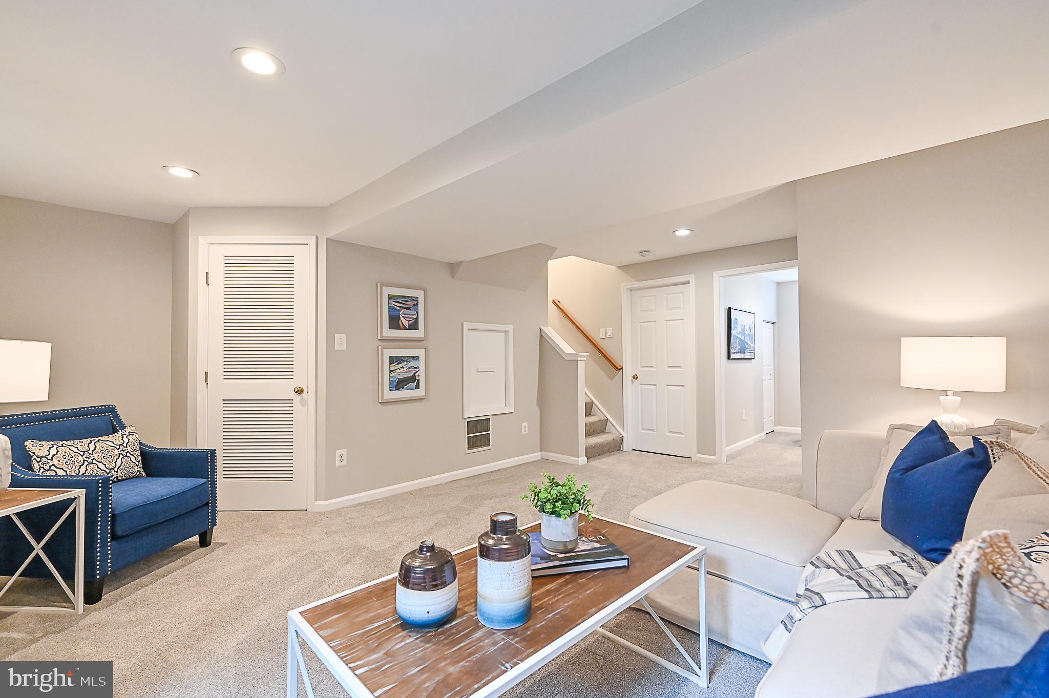 6356 Racetec Place Springfield, VA 22150 - Photo 43 of 51 a living room with furniture and wooden floor