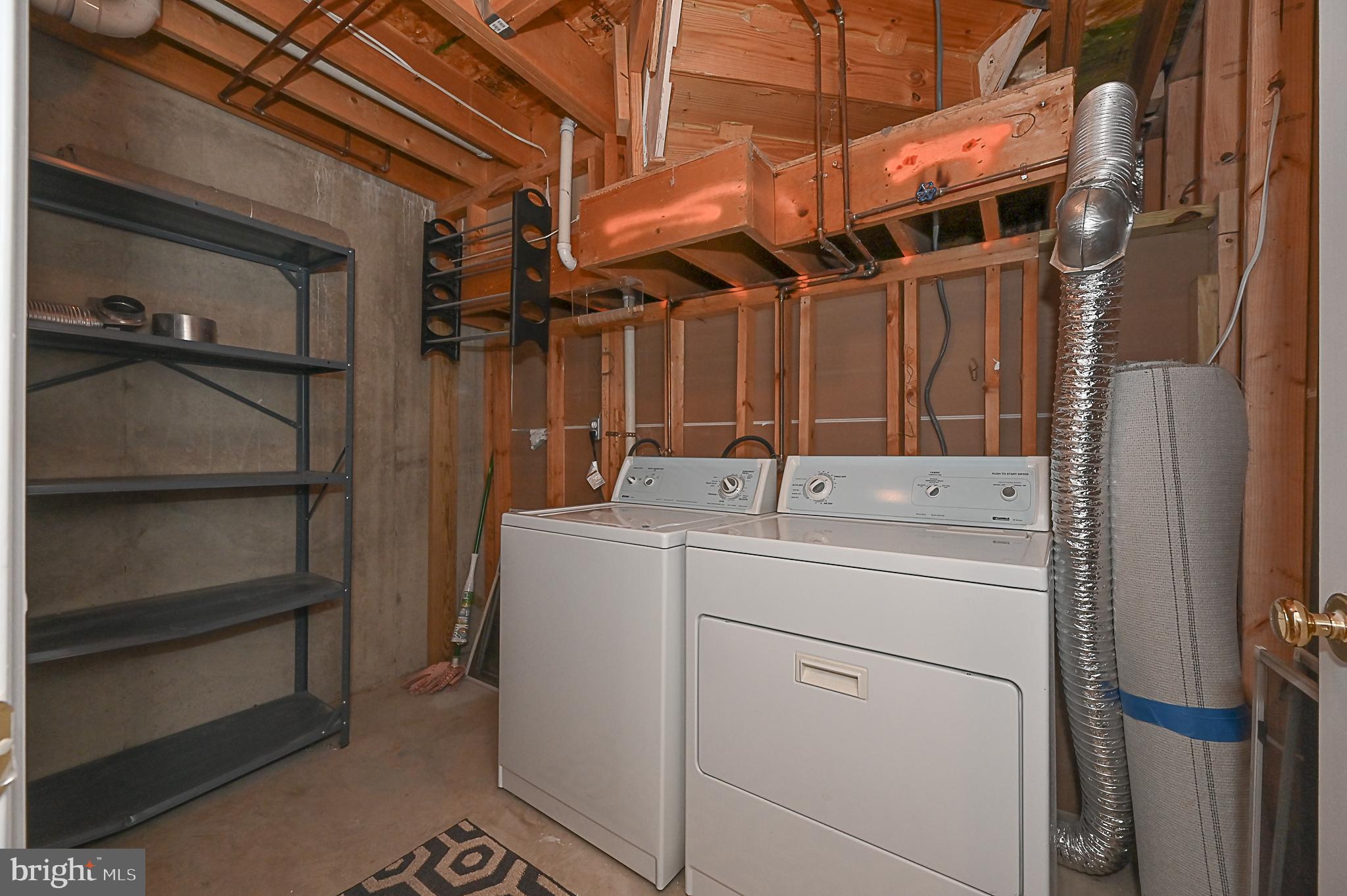 6356 Racetec Place Springfield, VA 22150 - Photo 47 of 51 a utility room with dryer and washer