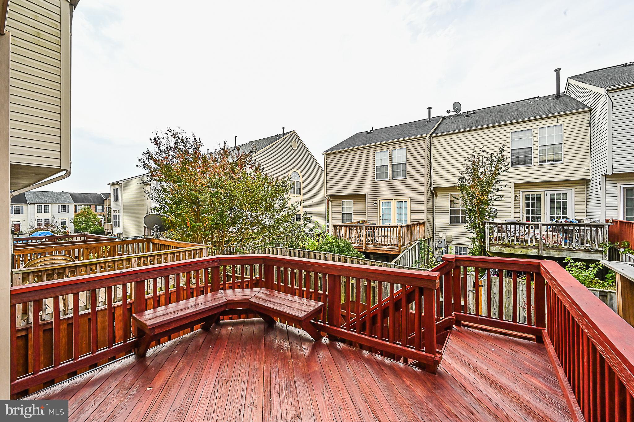 6356 Racetec Place Springfield, VA 22150 - Photo 5 of 51 a view of a street with a deck