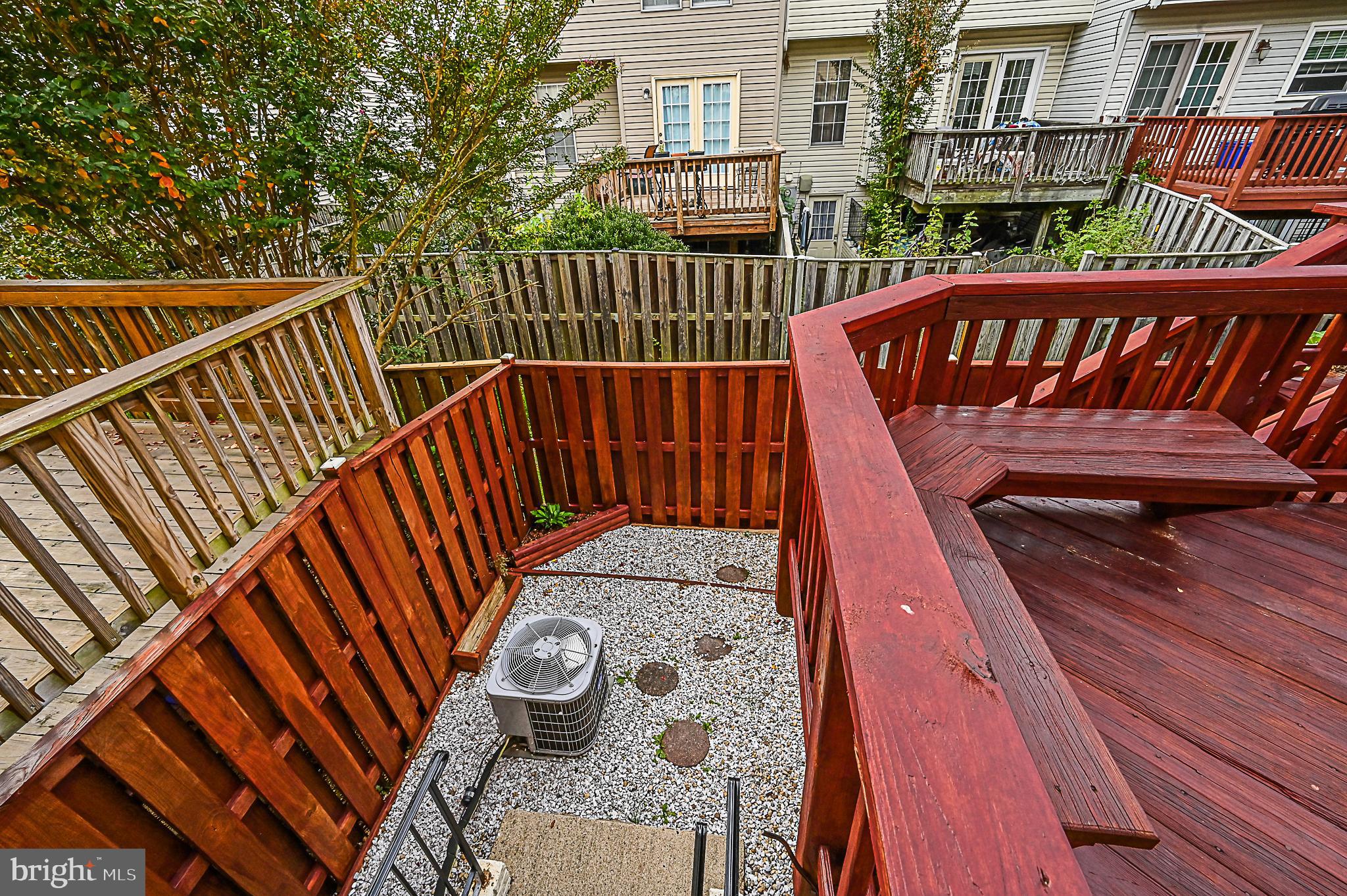 6356 Racetec Place Springfield, VA 22150 - Photo 7 of 51 a view of stairs and deck