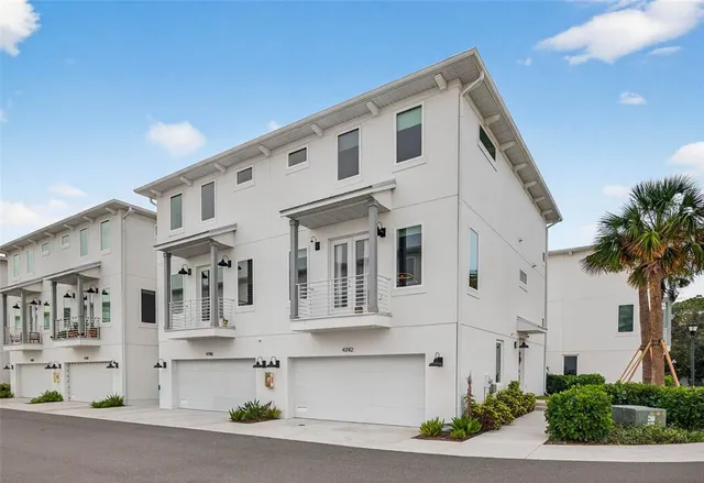 a front view of a large white building