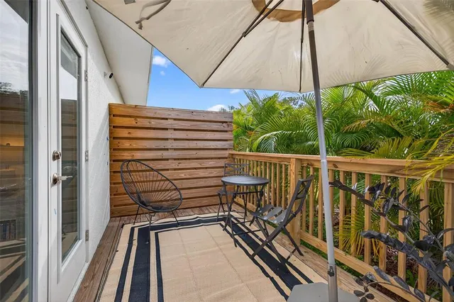an aerial view of a house with a ocean view