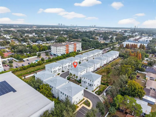 a view of a swimming pool with a table and chairs