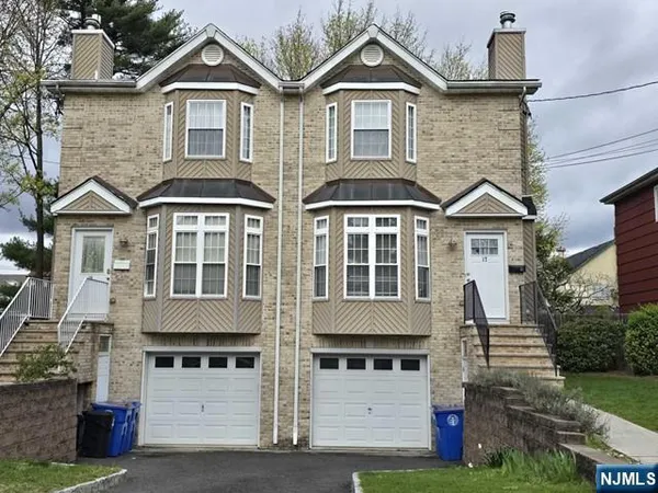 a front view of residential houses
