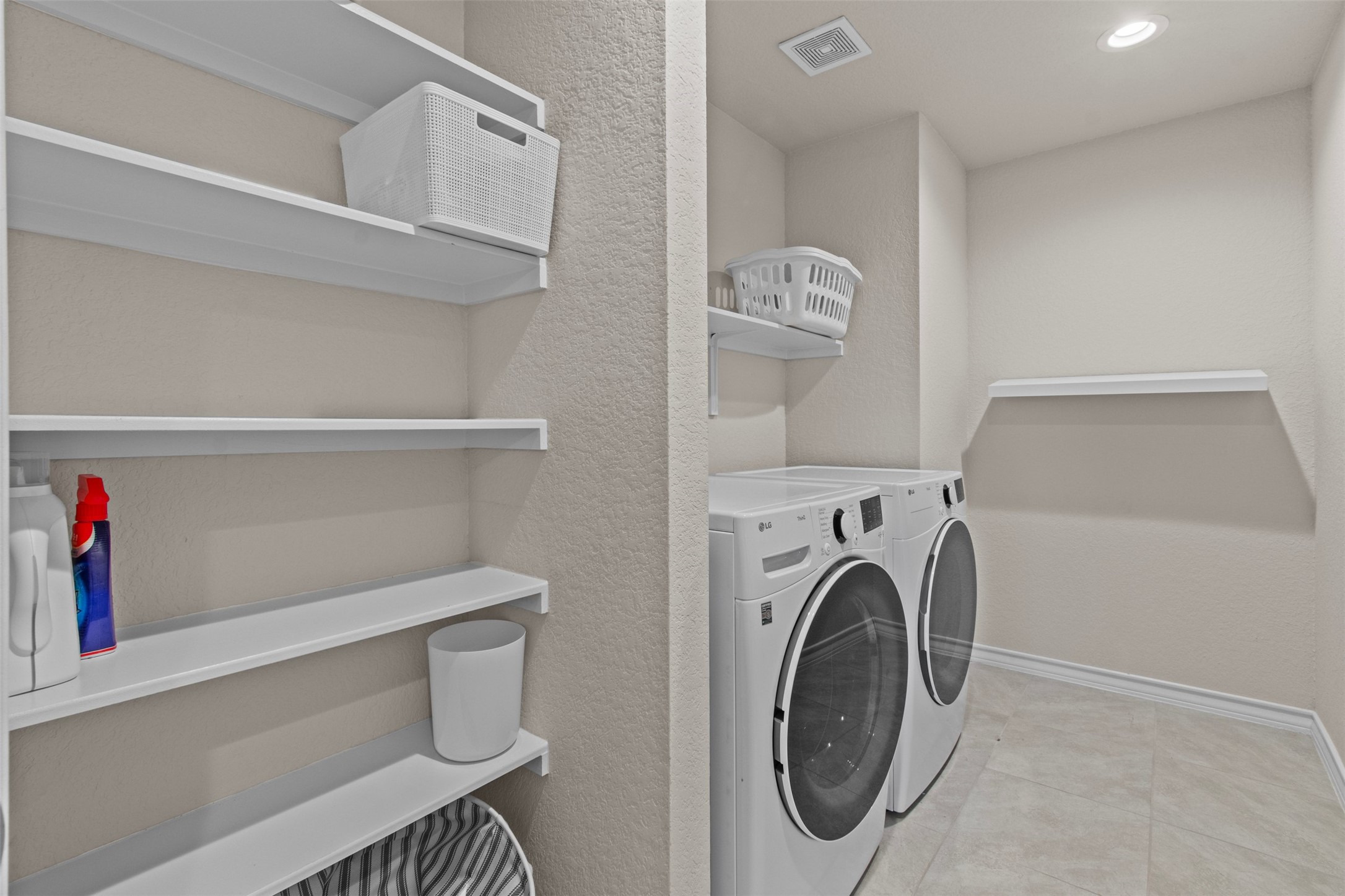 904 American Trail, Unit 2 Leander, TX 78641 - Photo 20 of 29 Spacious laundry room with built in shelving.