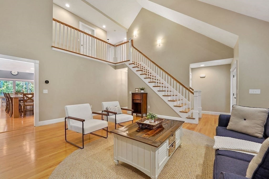 31 Douglas Road Sutton, MA 01590 - Photo 18 of 42 a living room with furniture and a table