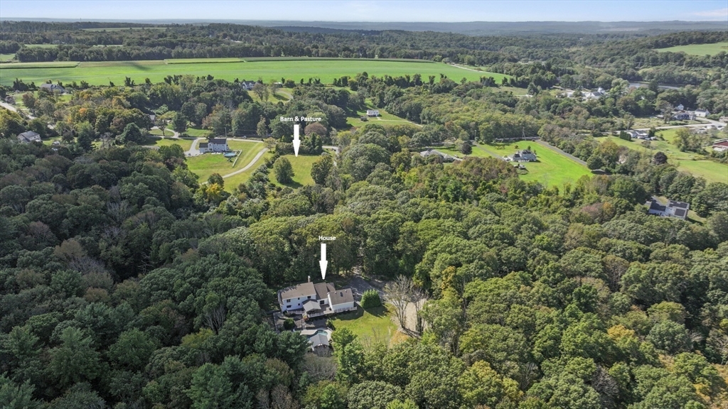 31 Douglas Road Sutton, MA 01590 - Photo 4 of 42 an aerial view of residential house with outdoor space and trees all around