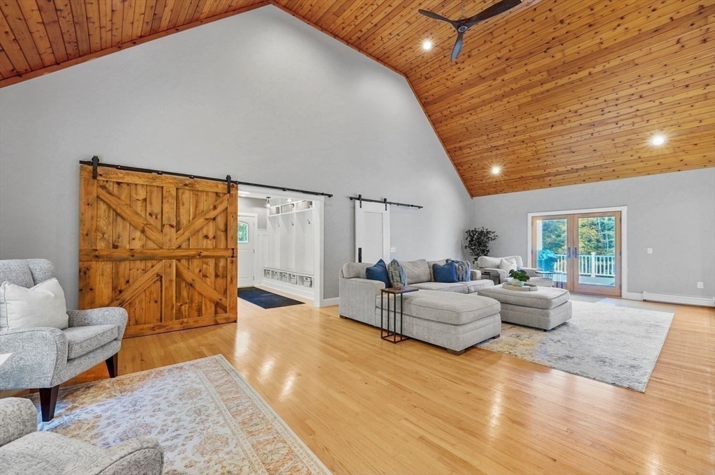 31 Douglas Road Sutton, MA 01590 - Photo 7 of 42 a living room with furniture and wooden floor