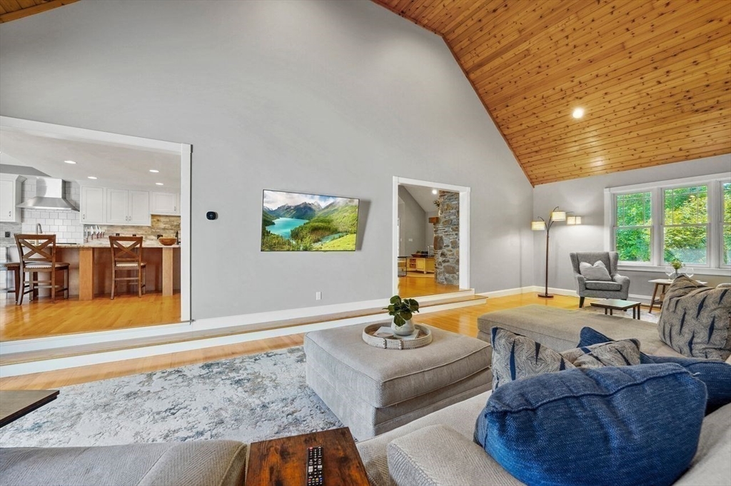 31 Douglas Road Sutton, MA 01590 - Photo 9 of 42 a living room with furniture and a table