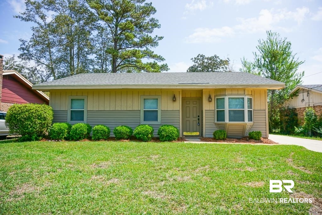 4377 Fathbrook Lane Mobile, AL 36693 - Photo 2 of 19 Ranch-style home featuring a front yard, board and batten siding, and roof with shingles
