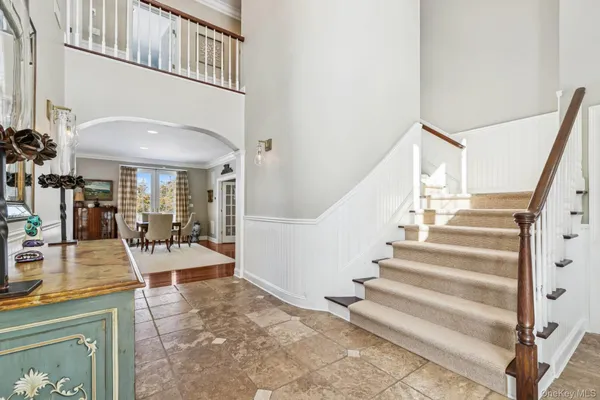 a view of staircase with living room