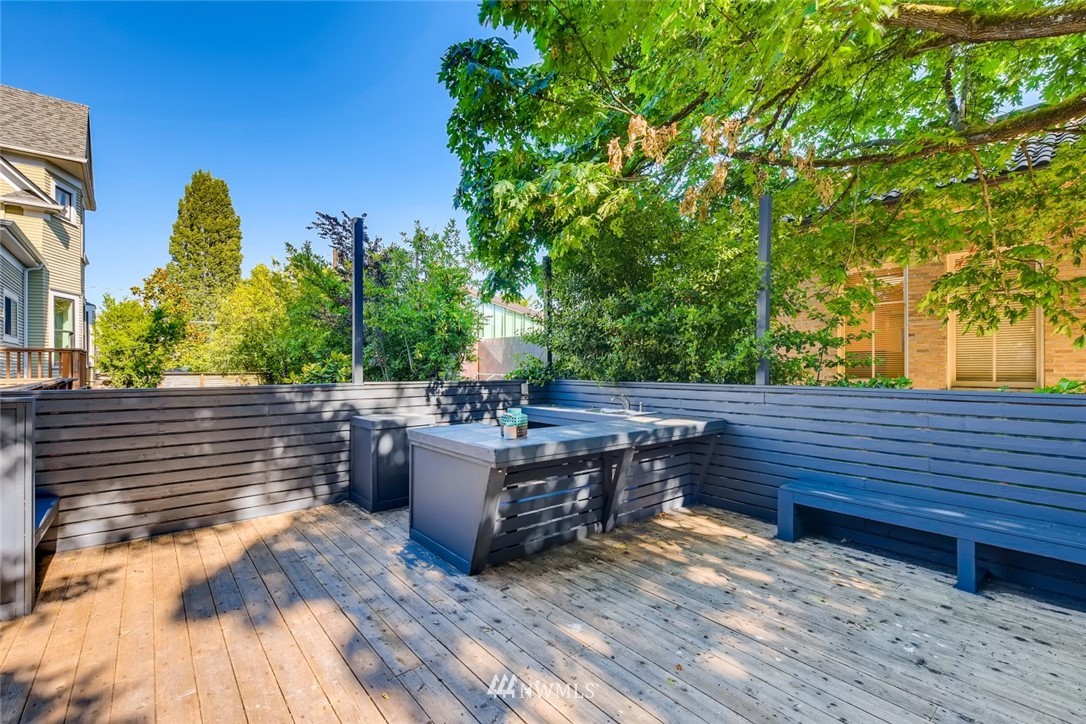 117 24th Avenue Seattle, WA 98122 - Photo 38 of 39 a view of a wooden deck and a yard