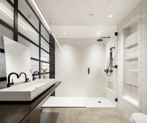 a bathroom with a sink and mirror