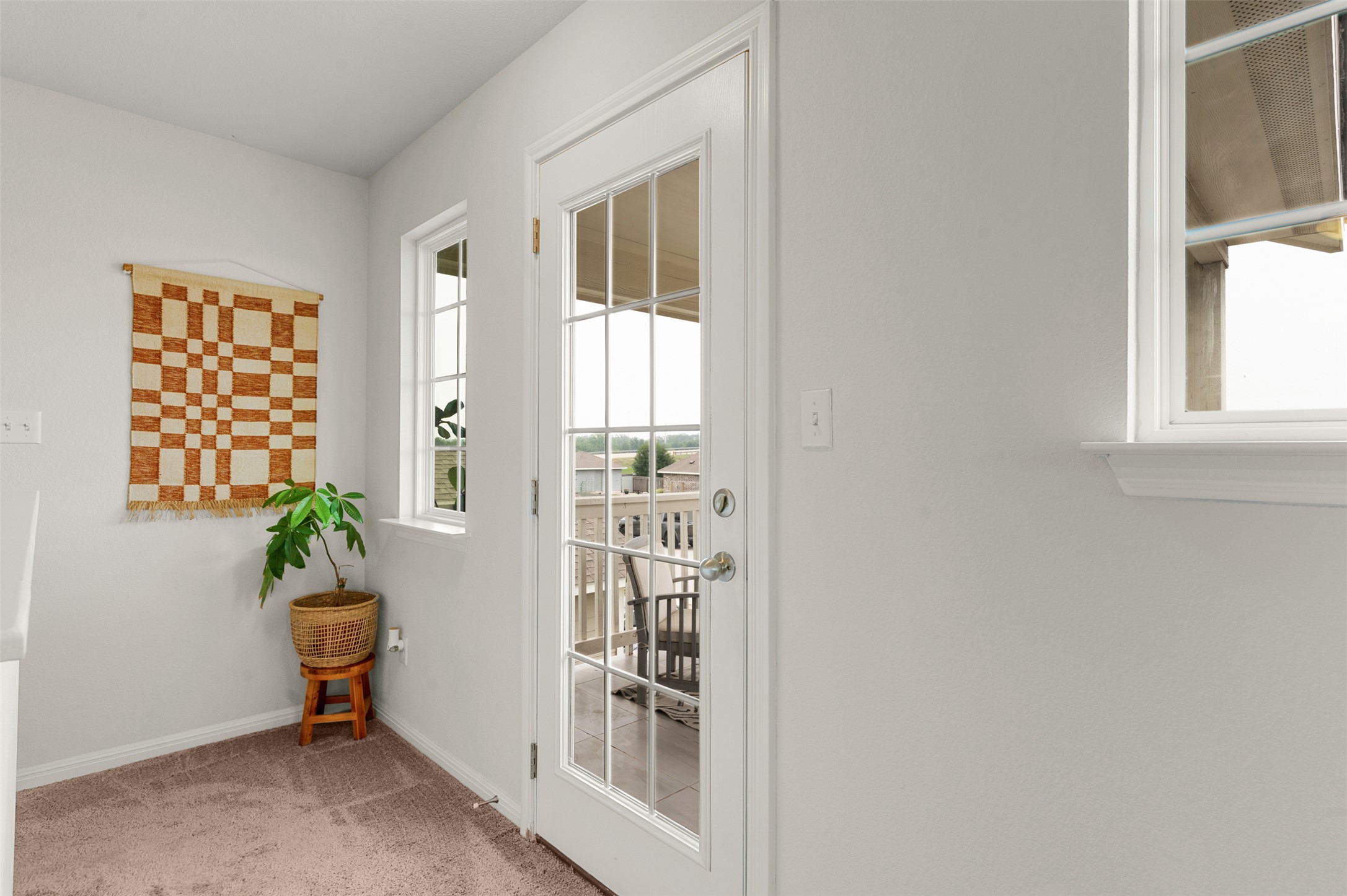 925 Stampede Road San Marcos, TX 78666 - Photo 21 of 39 Staircase Second Level Landing to Balcony
