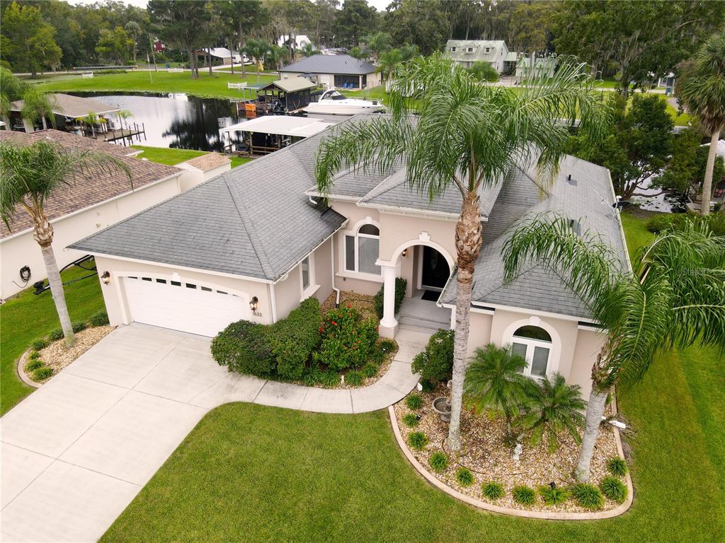 1633 Yellow Brick Road Astor, FL 32102 - Photo 1 of 1 4/3 immaculately kept home on a deep water canal just a short distance to the St. Johns River.
