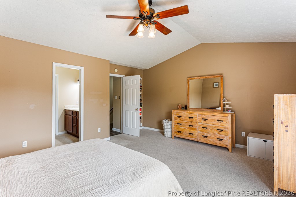 461 Lands End Road Fayetteville, NC 28314 - Photo 19 of 31 a bedroom with a bed and a dresser