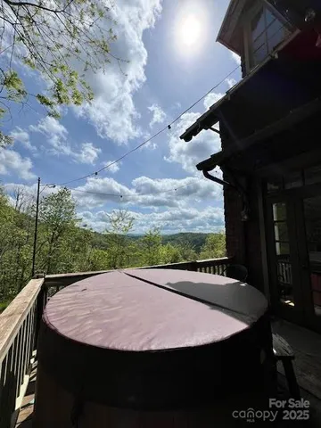 a view of a swimming pool with a yard
