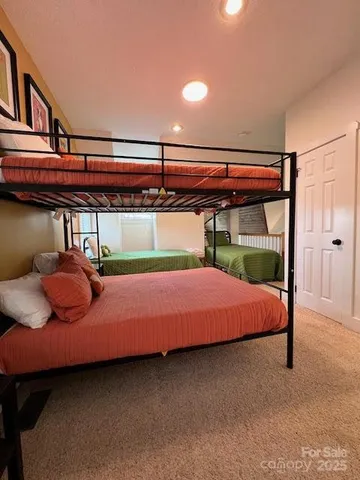 a bedroom with a bed and a walk in closet