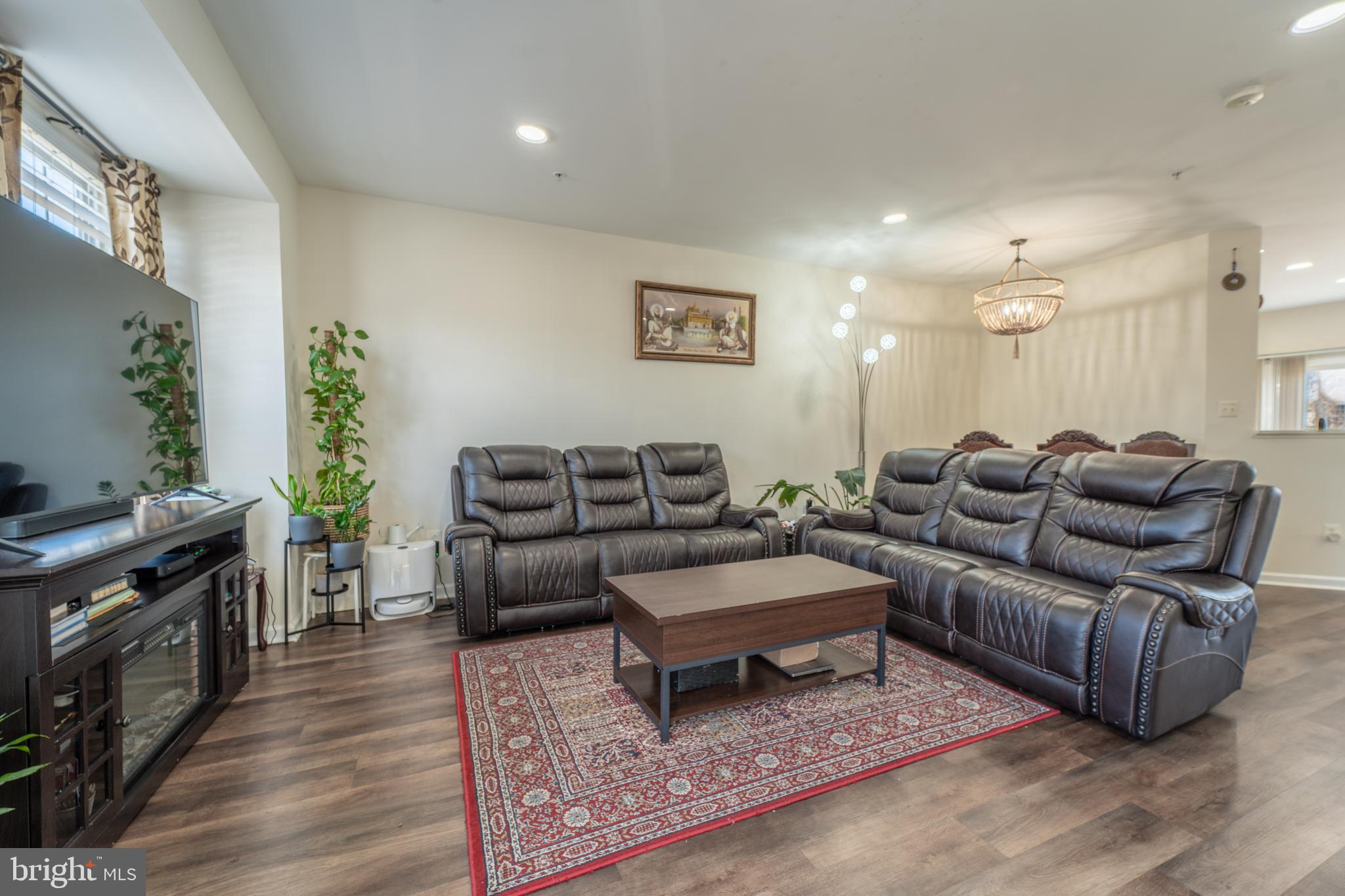 9659 Biggs Road Baltimore, MD 21220 - Photo 2 of 26 a living room with furniture and a wooden floor