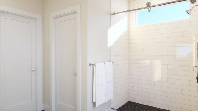 a bedroom with a bed and a bathroom