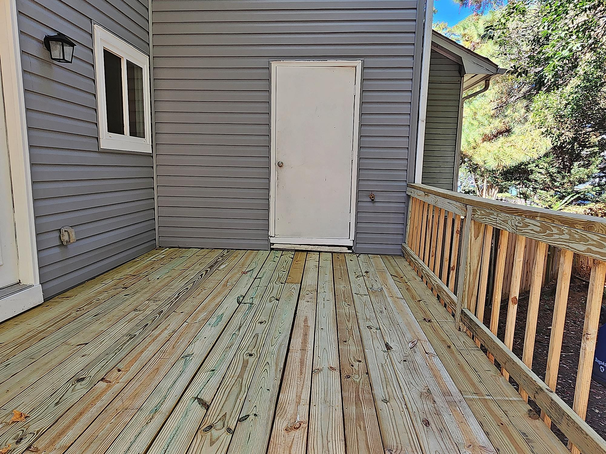 3303 Comstock Road Raleigh, NC 27604 - Photo 4 of 18 a view of wooden floor in a balcony