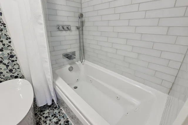 a view of storage and utility room with empty racks