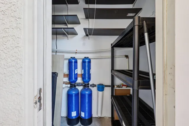 a view of balcony with a table and chairs